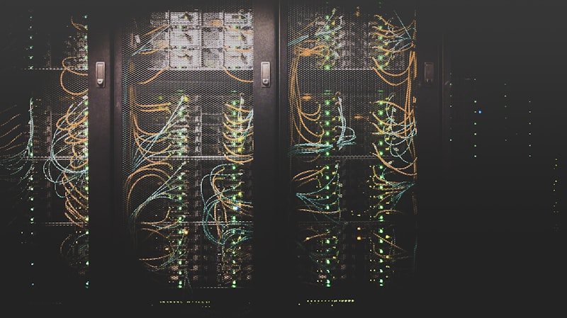 Server room with violet ambient light indicators, no woman